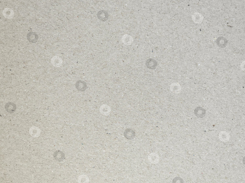 Скачать Приглушенный бежевый фон с текстурой органического картона фотосток Ozero