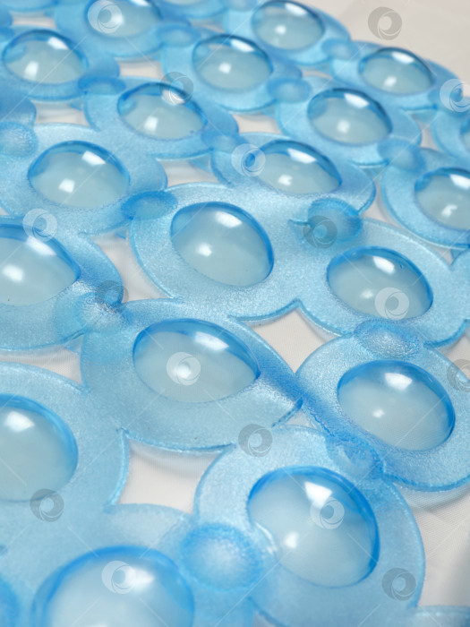 Скачать Голубой коврик для ванной из поливинилхлорида, вид вблизи фотосток Ozero