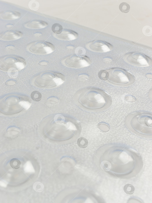 Скачать Белый коврик для ванной из поливинилхлорида, пузырьки, вид вблизи фотосток Ozero