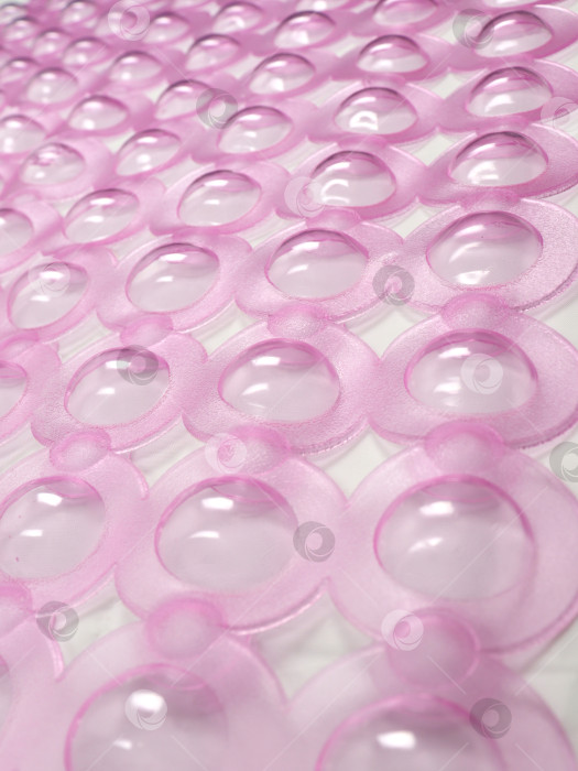 Скачать Розовый коврик для ванной из поливинилхлорида, пузырьки, вид вблизи фотосток Ozero