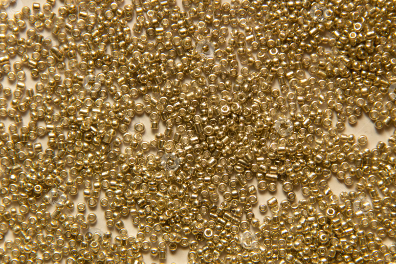 Скачать Фон из золотых бусин фотосток Ozero