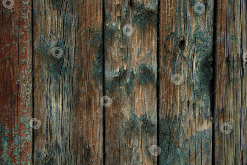 Скачать Темная старая деревянная поверхность с остатками краски. фотосток Ozero