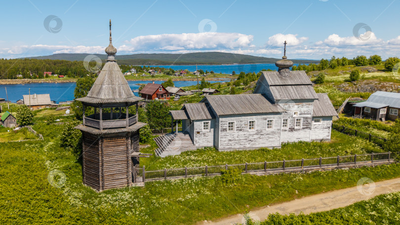 Скачать Село Ковда, Россия - 06.2021: [Село Ковда и Никольская церковь с высоты] фотосток Ozero