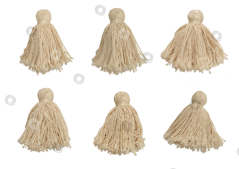 Скачать Бежевые хлопчатобумажные кисточки - Изолированные на белом фоне фотосток Ozero