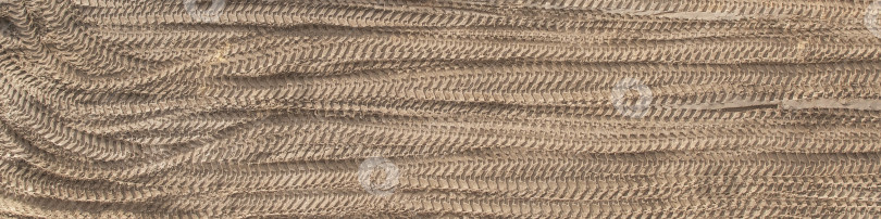 Скачать Многочисленные следы строительной техники на строительной площадке фотосток Ozero