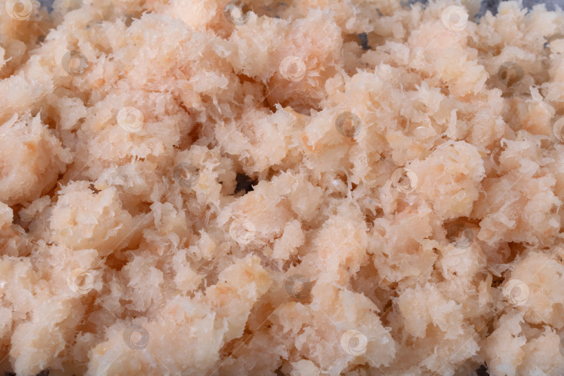 Скачать Фарш из белой рыбы крупным планом. Ингредиенты для приготовления горячего блюда фотосток Ozero