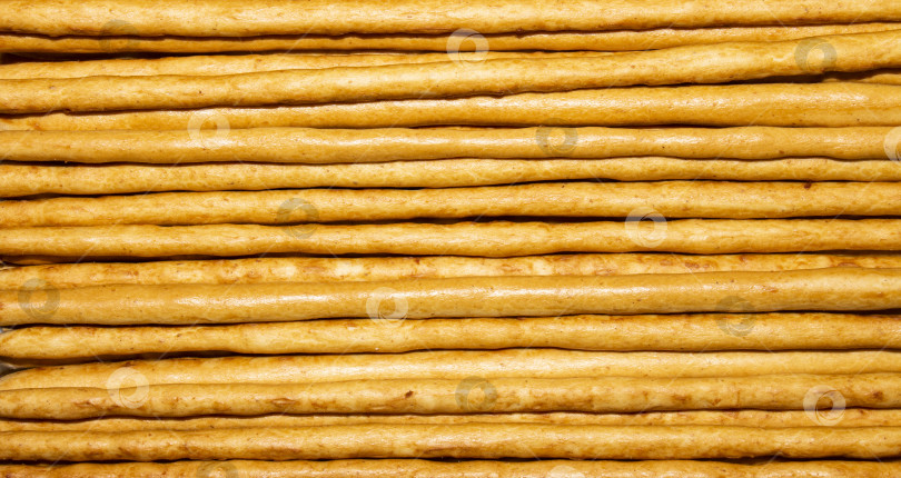 Скачать Хлебобулочные изделия из сладкой соломки.Сладкая соломка для чая.Палочки из сладкой соломки. фотосток Ozero