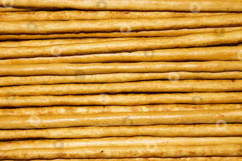 Скачать Хлебобулочные изделия из сладкой соломки.Сладкая соломка для чая.Палочки из сладкой соломки. фотосток Ozero