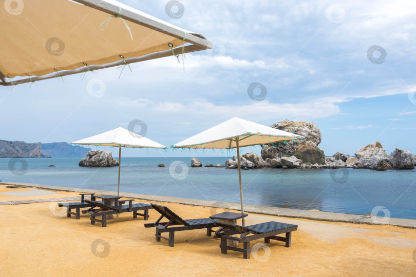 Скачать Пляж и зонтики фотосток Ozero