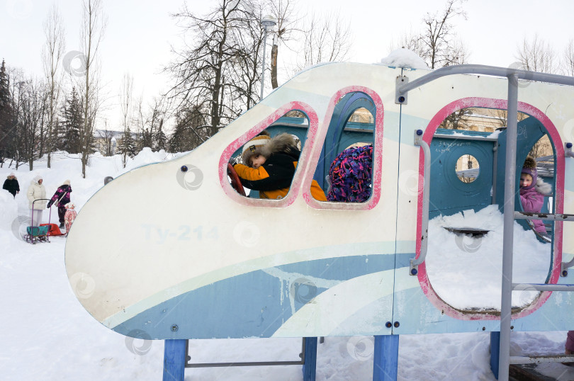 Скачать Казань, Татарстан, Россия - февраль 2026: Мальчик за штурвалом самолёта фотосток Ozero