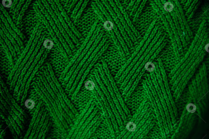Скачать Мягкая и уютная фактура вязаного изделия. Ручное или машинное вязание, рукоделие, свитера, трикотажные изделия. фотосток Ozero