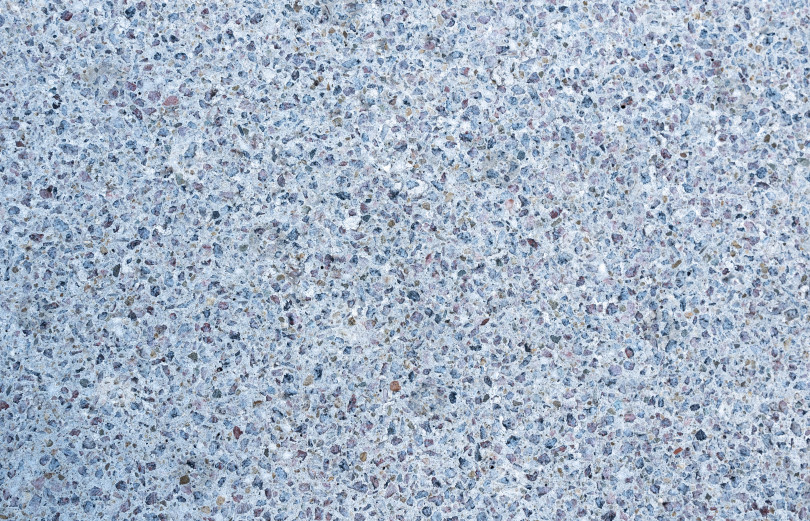 Скачать Фон из бетонной стены. Текстурированная поверхность из серого бетона, подходящая для фотосъемки и дизайна фотосток Ozero