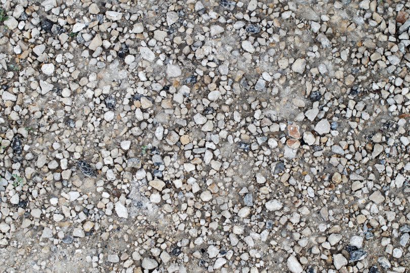 Скачать Крупный гравий на дороге фотосток Ozero