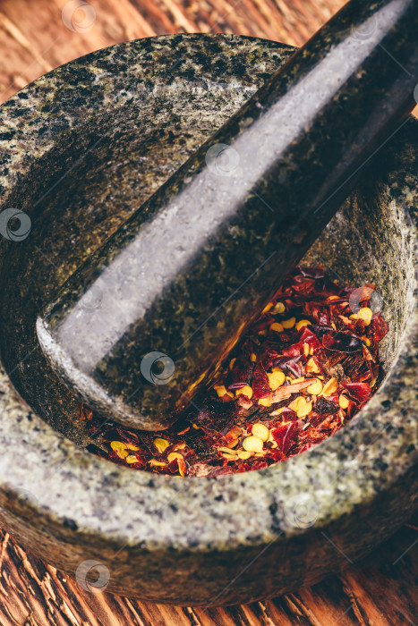 Скачать Измельченный красный перец чили фотосток Ozero