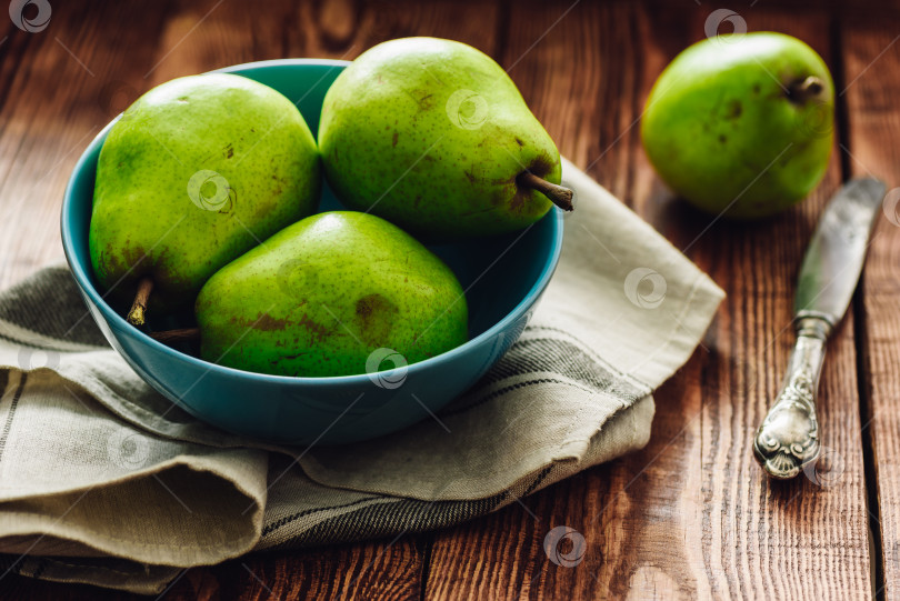 Скачать Зеленые груши в миске фотосток Ozero