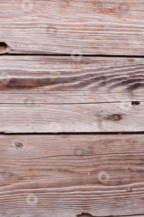 Скачать Фон выполнен из дерева с текстурой. Рисунок поверхности деревянного стола из деревянных досок, абстрактная текстура. фотосток Ozero