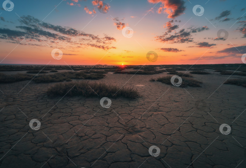 Скачать Фантастический закат на солончаках близ соленого озера Элтон фотосток Ozero