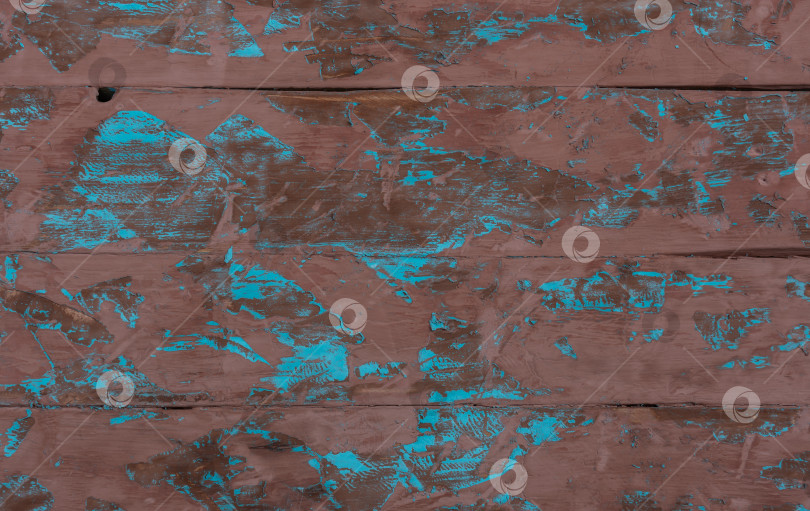 Скачать Старые потертые деревянные доски с облупившейся коричневой и синей краской фотосток Ozero