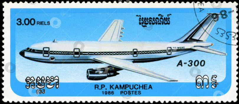 Скачать КАМБОДЖА - ОКОЛО 1986 года: на марке, напечатанной Камбоджей, изображен самолет А-300, около 1986 года. фотосток Ozero
