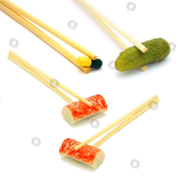 Скачать суши с огурцом и таблеткой на палочке для еды фотосток Ozero