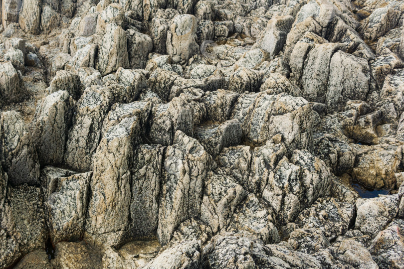 Скачать фон из натурального камня, остатки лавовых базальтовых колонн образуют своеобразные ступени фотосток Ozero