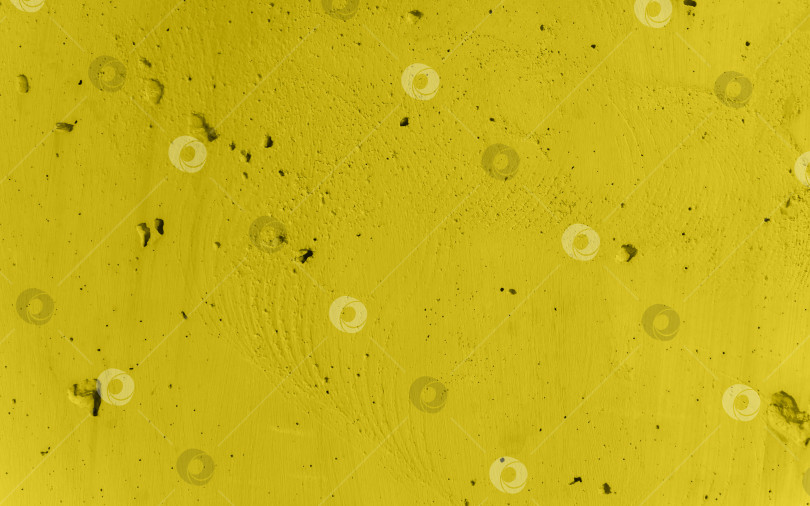 Скачать Текстура бетонной стены. Неровная и шероховатая поверхность желтого цвета.Предыстория строительства. фотосток Ozero
