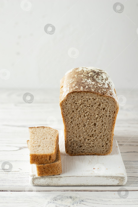 Скачать Нарезанный батон хлеба на закваске фотосток Ozero