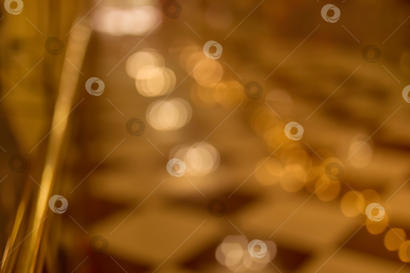 Скачать Абстрактная текстура с желтыми, оранжевыми, золотыми, красными огнями в расфокусировке и боке фотосток Ozero