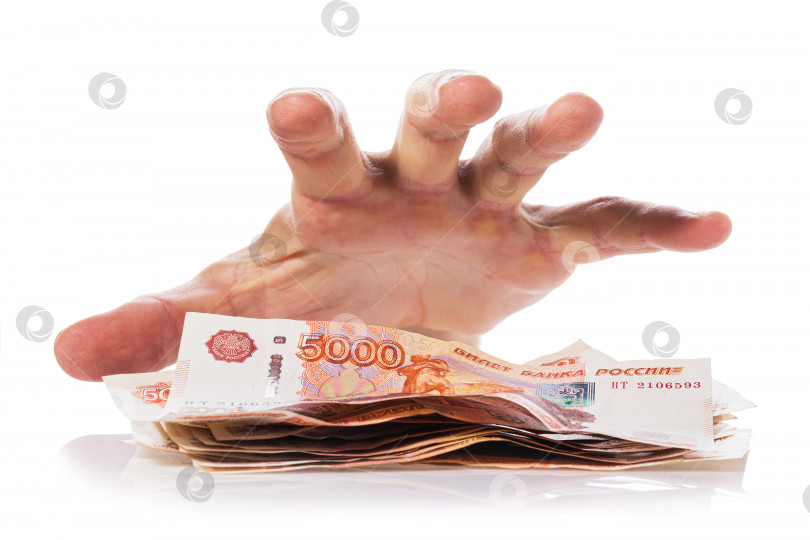 Скачать Рука, собирающаяся схватить деньги, выделена на белом фоне. Концепция кражи или мошенничества с валютой фотосток Ozero