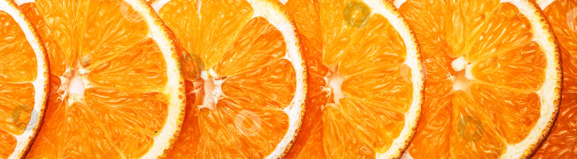 Скачать Ломтики апельсинов - вкусная съедобная фоновая рамка фотосток Ozero