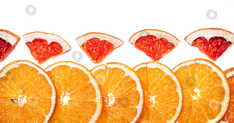 Скачать Ломтики апельсина и грейпфрута - восхитительный съедобный фоновый бордюр фотосток Ozero