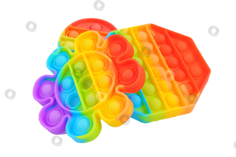 Скачать Pop it toy силиконовые сенсорные антистрессовые игрушки для непосед красочная радужная игра. Изолированный на белом фоне фотосток Ozero