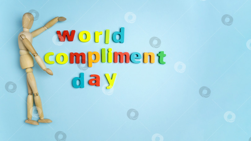 Скачать Всемирный день комплиментов, национальный праздник 1 марта. Синий фон. Вид сверху. Пространство для копирования фотосток Ozero