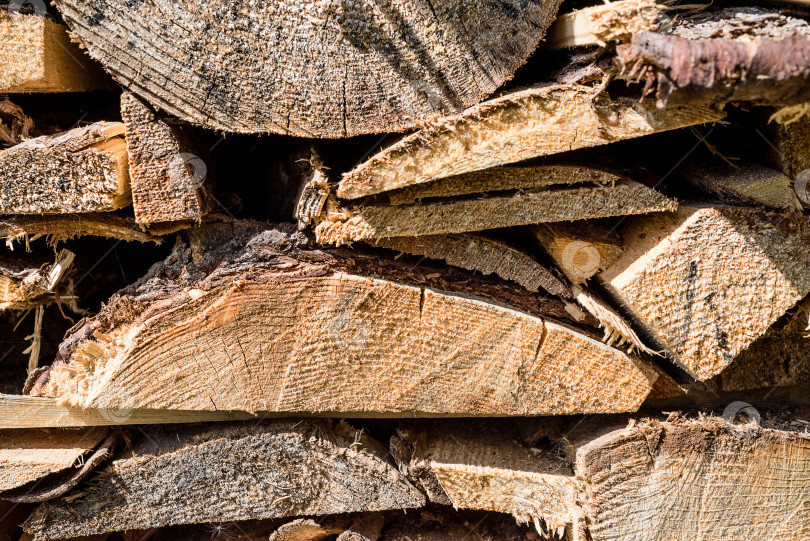 Скачать Деревянная текстура крупным планом, деревянные доски, сложенные в поленницу фотосток Ozero