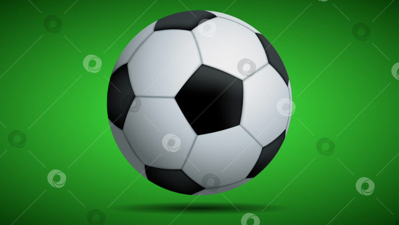 Скачать Классический футбольный мяч, выделенный на зеленом фоне фотосток Ozero