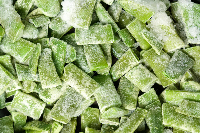 Скачать Замороженная зеленая фасоль. Концепция здорового питания, основы кулинарии. Избирательный фокус фотосток Ozero