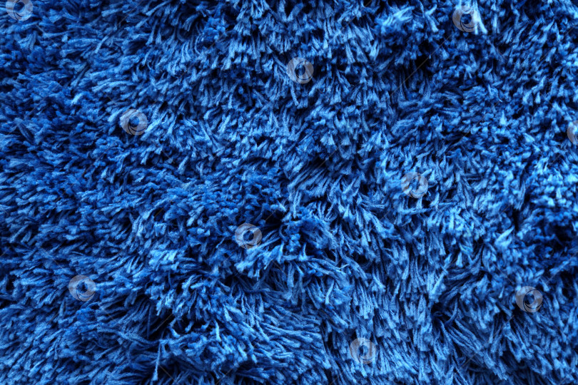 Скачать Синий фон ковра, фон с текстурой синей ткани, крупным планом. Избирательный фокус фотосток Ozero