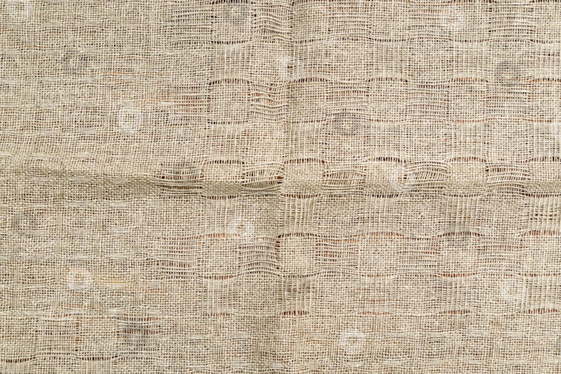 Скачать Фоновая текстура льняной ткани, покрывала, одежды. Текстильный абстрактный фон. фотосток Ozero