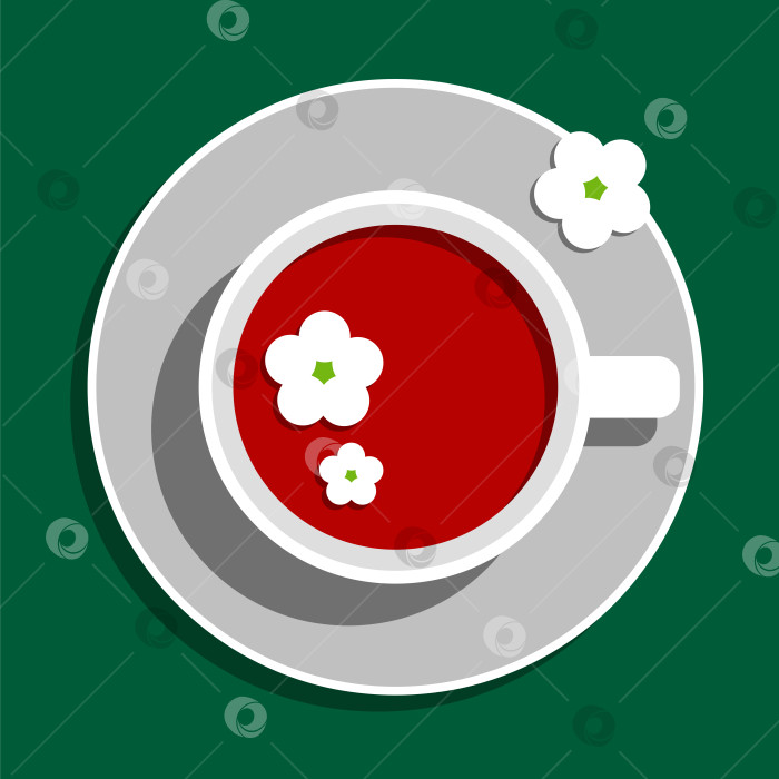 Скачать Чашка красного чая из гибискуса с белыми цветами на блюдце на зеленом фоне фотосток Ozero