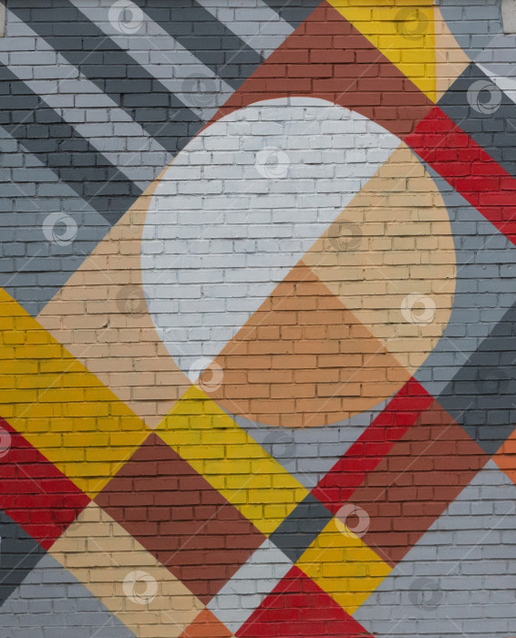 Скачать Кирпичная стена с абстрактным геометрическим рисунком. фотосток Ozero
