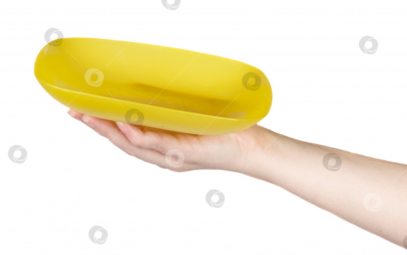 Скачать желтая пластина на женской руке на белом фоне фотосток Ozero