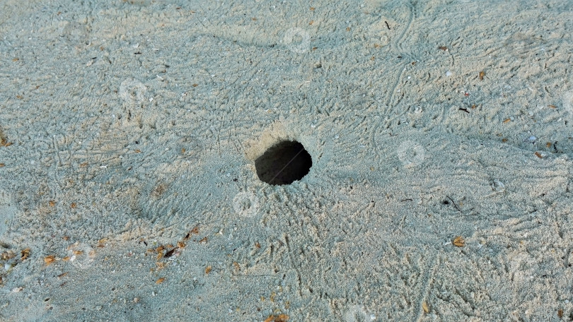 Скачать Фон - песок, в центре - черная дыра. фотосток Ozero