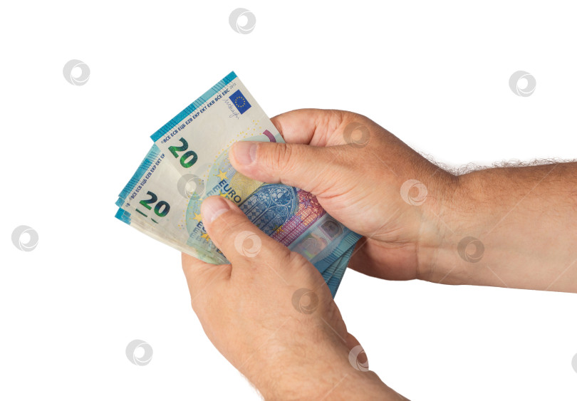 Скачать В руках мужчины купюры по двадцать евро. фотосток Ozero