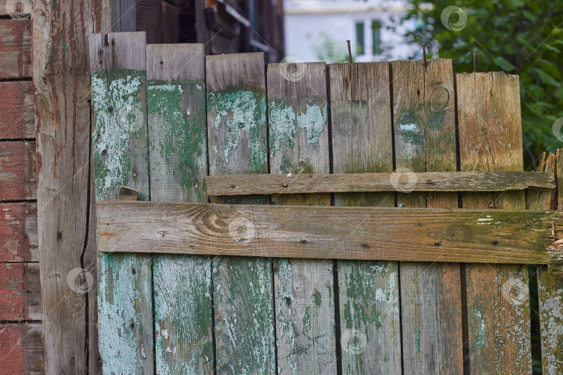 Скачать Фотография старого деревянного забора с выцветшей краской. фотосток Ozero