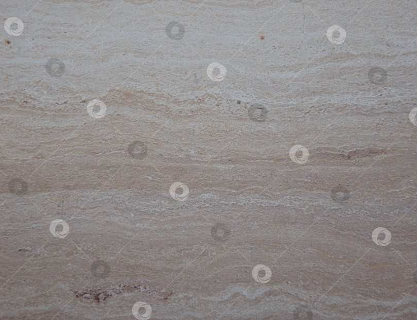Скачать Грязно-бежевый гранит с волнистым рисунком, полированная поверхность натурального камня крупным планом. фотосток Ozero