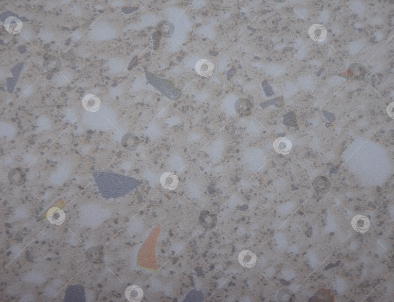 Скачать Бежевый гранит с белыми пятнами, полированная поверхность натурального камня крупным планом. фотосток Ozero