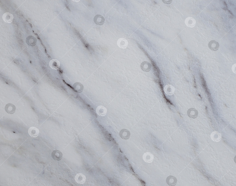 Скачать Белый мрамор с черными прожилками, полированная поверхность натурального камня. фотосток Ozero