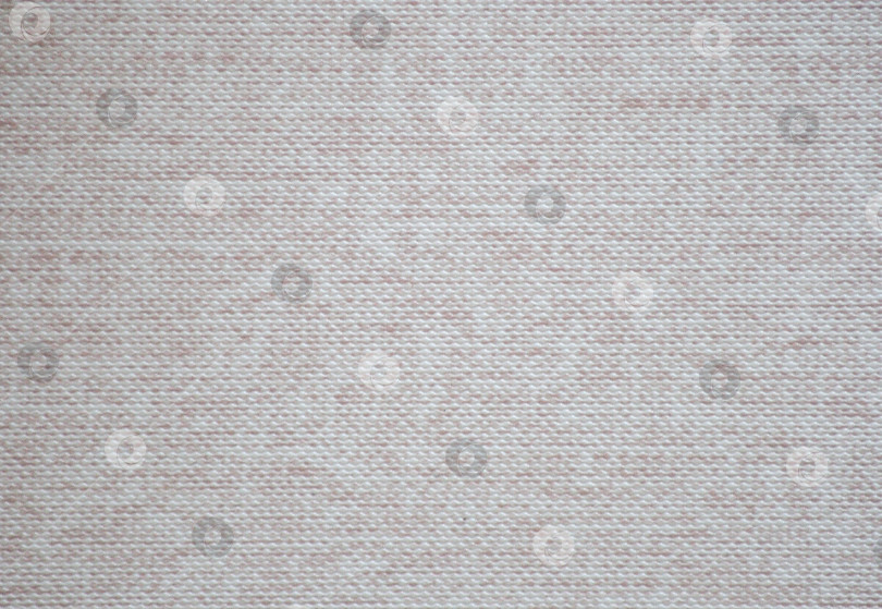 Скачать Фрагмент бледно-серой ткани с характерным рисунком плетения, крупным планом. фотосток Ozero