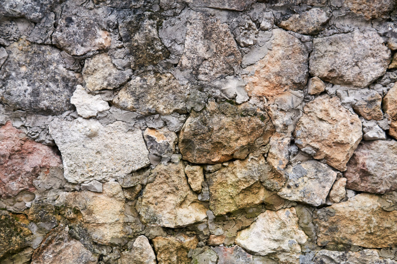 Скачать фон, текстура - старинная грубая кладка из натурального камня фотосток Ozero