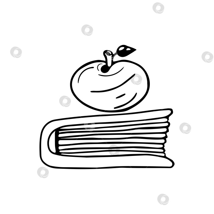 Скачать Нарисованное от руки яблоко-каракуль с листом, лежащим поверх книги. Символ знания и учености. Изолированный на белом фоне. фотосток Ozero